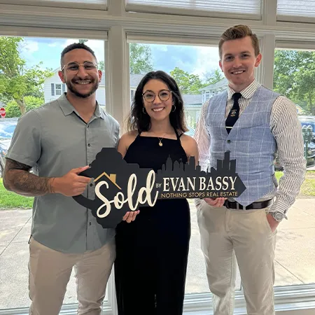 Evan Bassy closing a real estate deal in Michigan